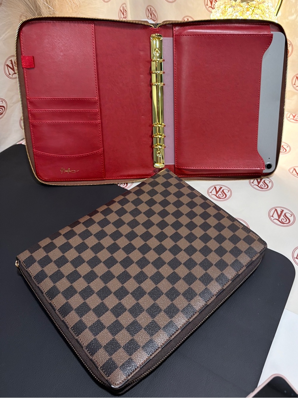 Nexella Luxe B5 Leather Zipfolio Organizer in Brown Checkered and Red interior.
